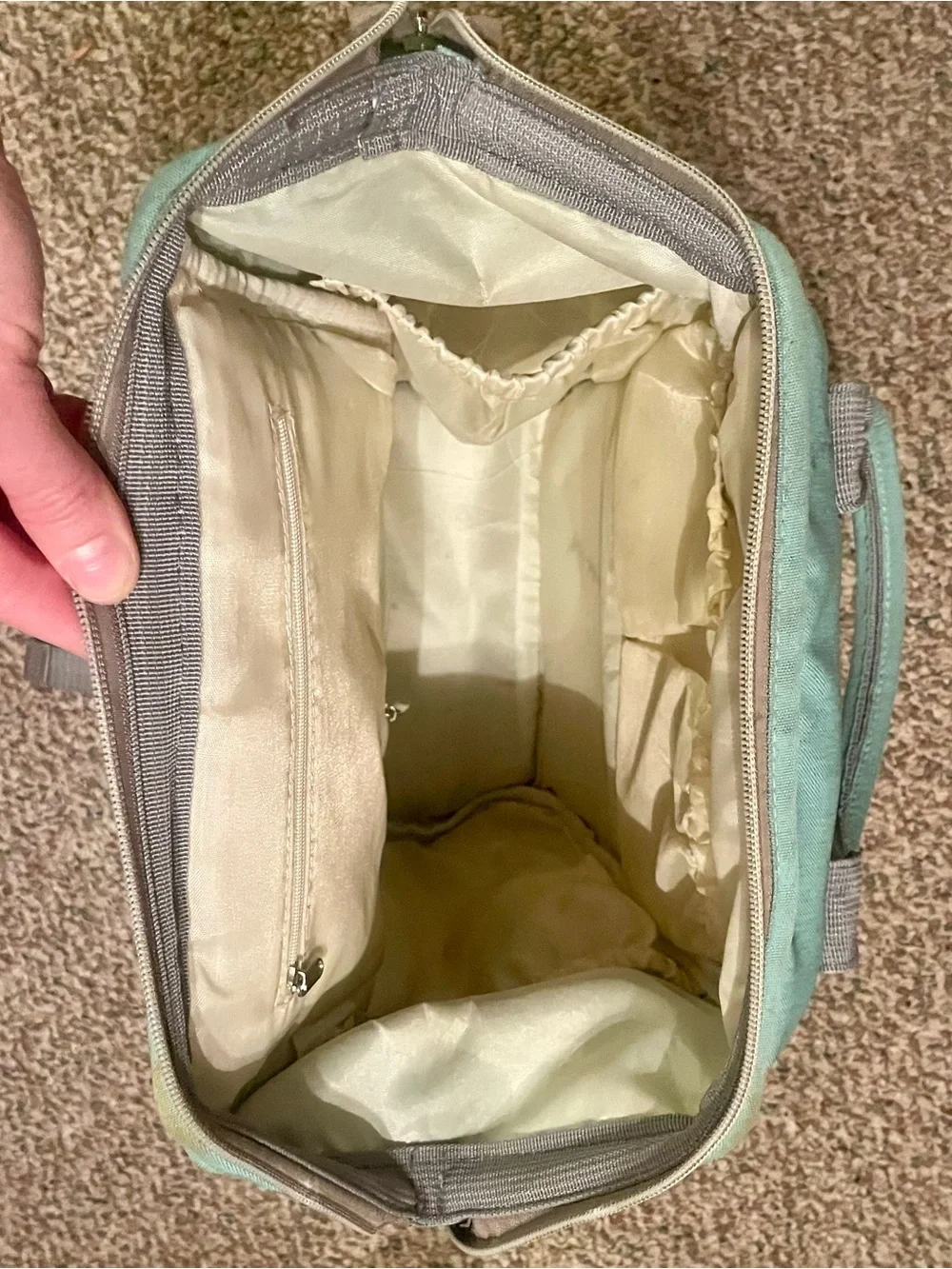 Mint Green Canvas Backpack with Top Handle and Front Pocket